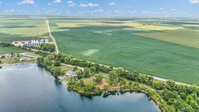 a view of a lake with a yard