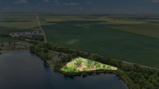 a view of a lake with a yard