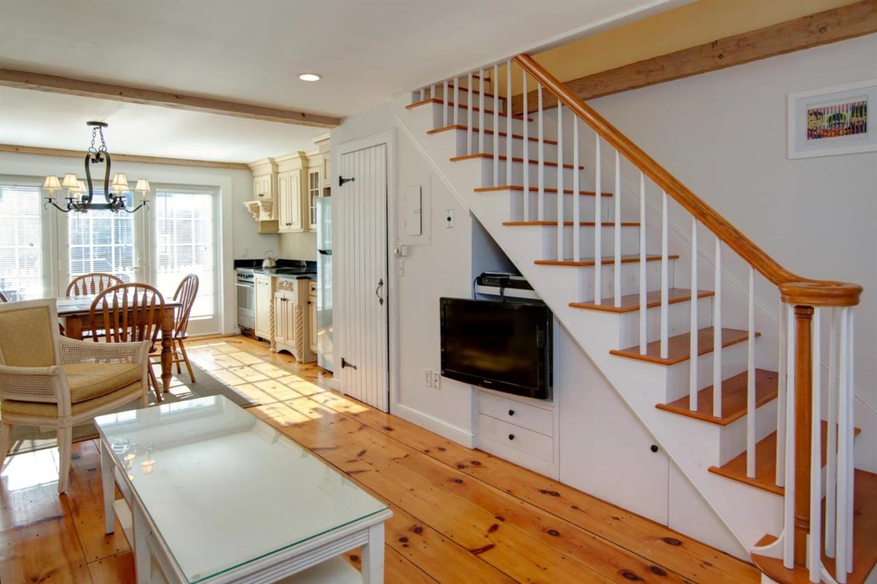 9 Hammock Pond Road Mashpee, MA 02649 - Photo 5 of 16 a living room with furniture and a flat screen tv