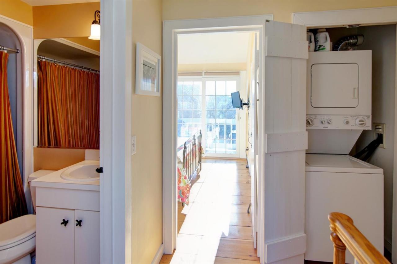 9 Hammock Pond Road Mashpee, MA 02649 - Photo 10 of 16 a bathroom with a sink a toilet and shower