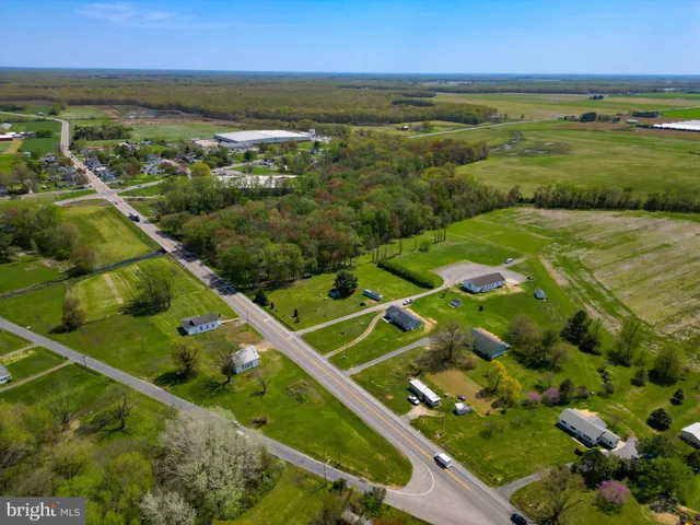a view of a golf course with a swimming pool