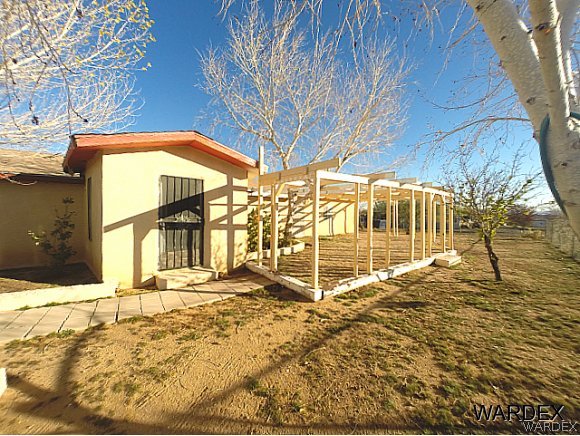 303 South Hano Road Golden Valley, AZ 86413 - Photo 30 of 30 a view of a backyard