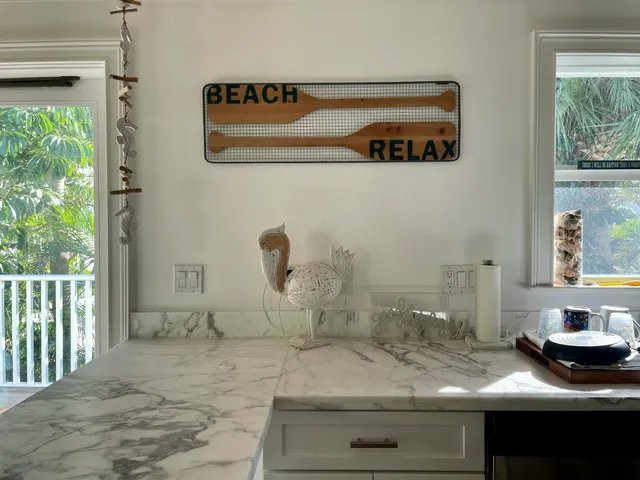 a kitchen with a sink and window
