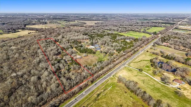 an aerial view of beach and ocean