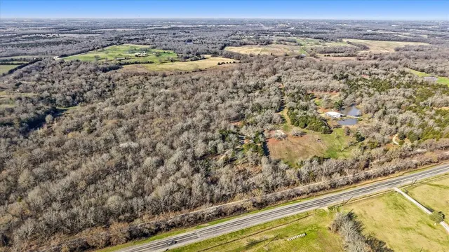 an aerial view of beach and city