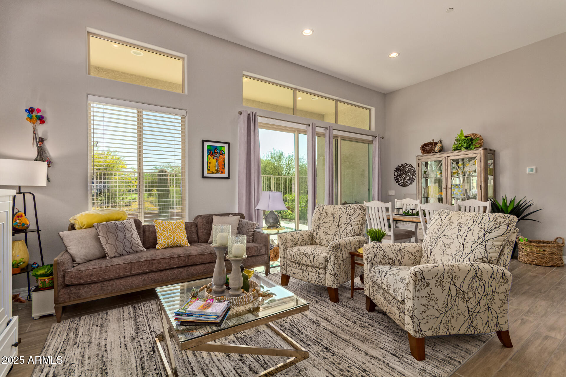 18861 East Blue Sky Drive Rio Verde, AZ 85263 - Photo 11 of 22 a living room with furniture and a large window