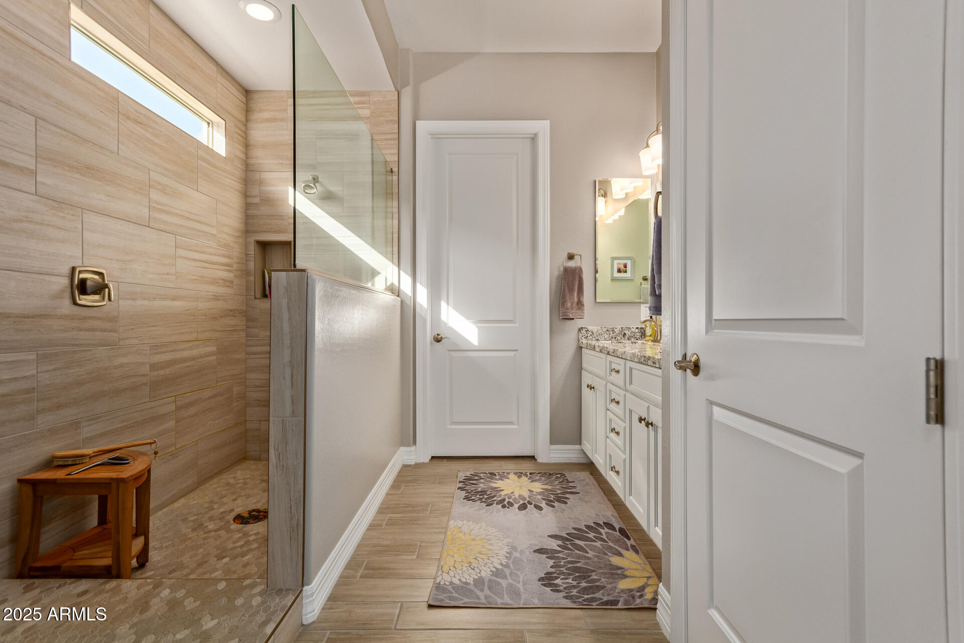 18861 East Blue Sky Drive Rio Verde, AZ 85263 - Photo 13 of 22 a bathroom with a shower and a glass door