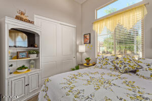 18861 East Blue Sky Drive Rio Verde, AZ 85263 - Photo 16 of 22 a bedroom with a bed and a window