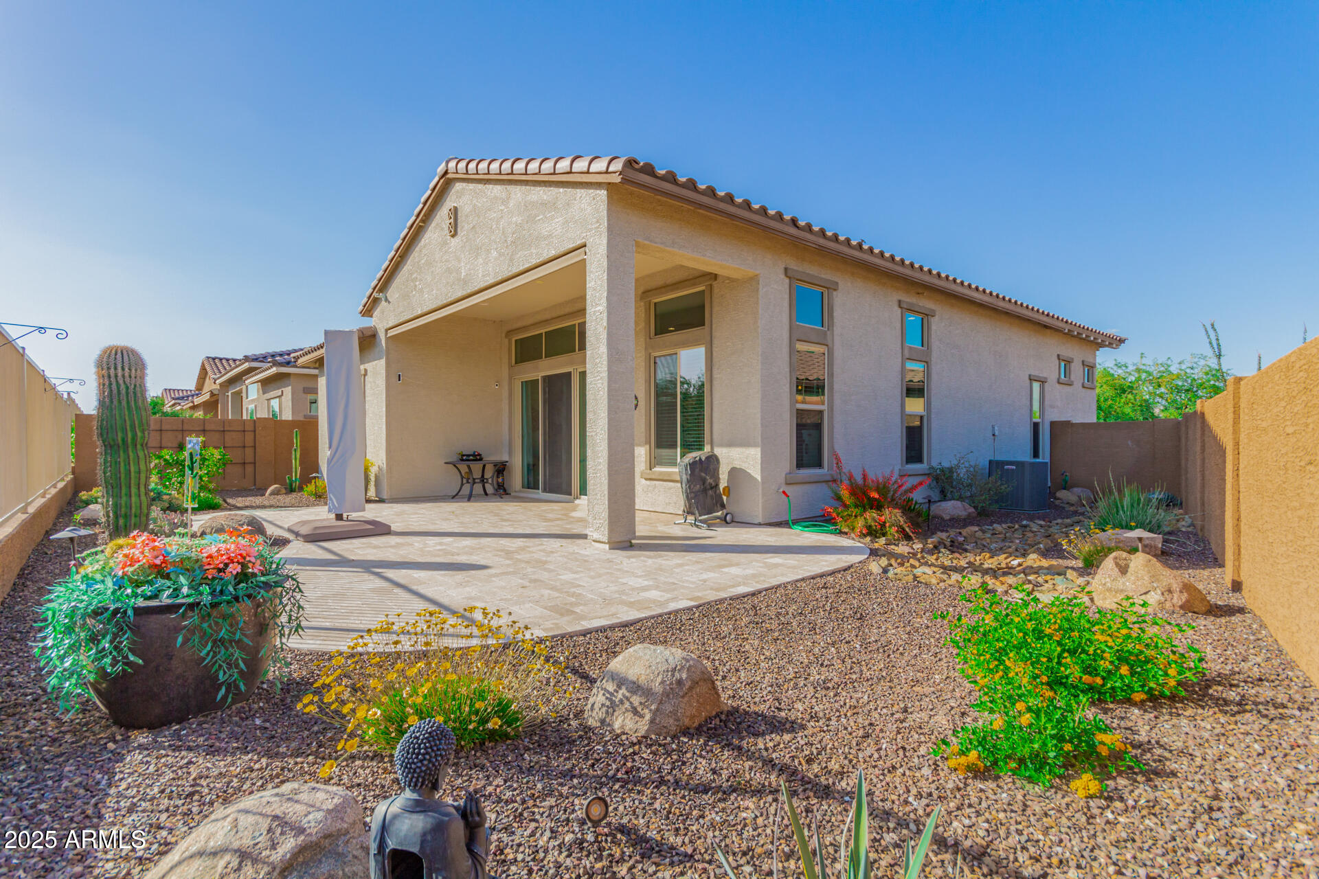 18861 East Blue Sky Drive Rio Verde, AZ 85263 - Photo 19 of 22 a front view of a house with plants