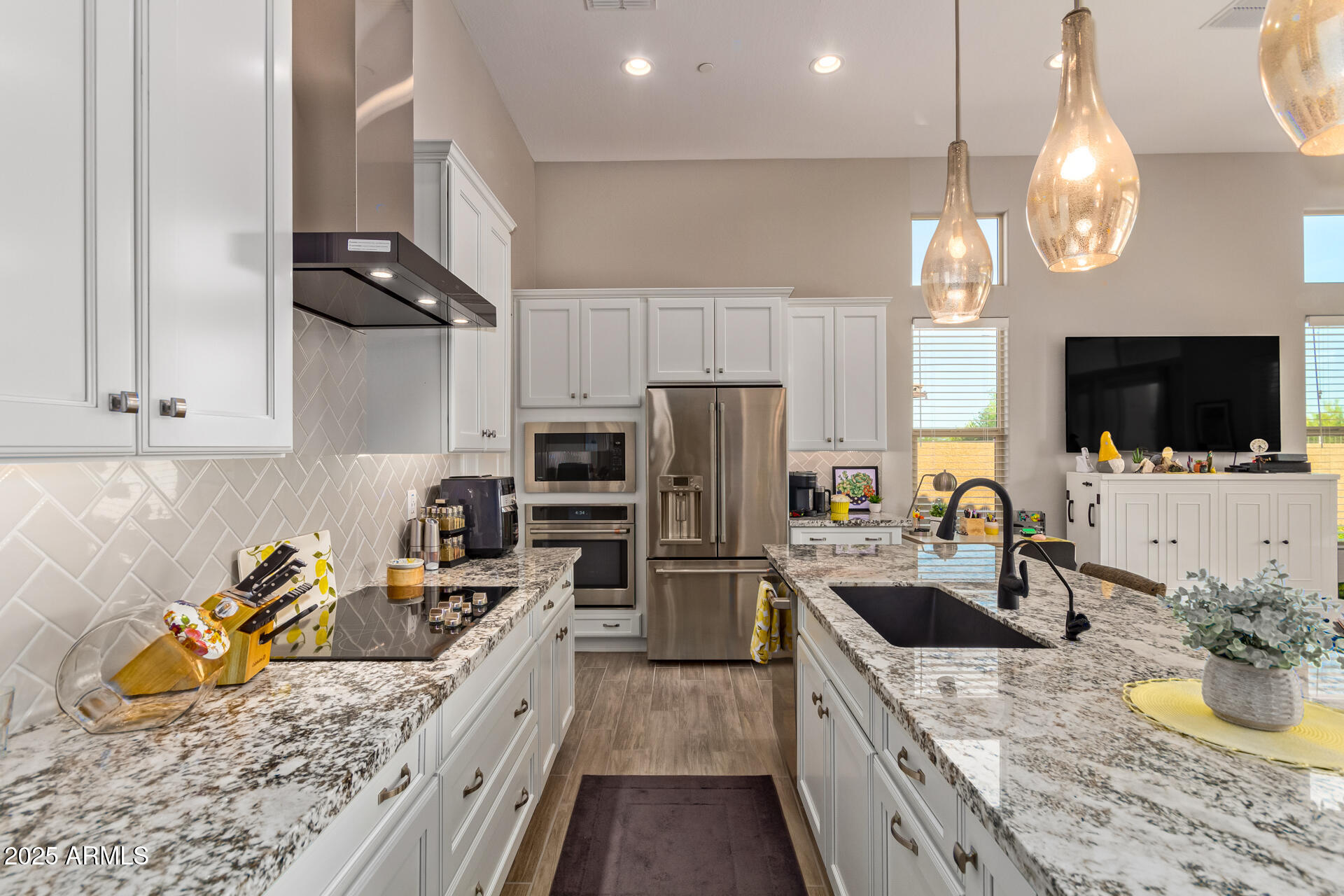 18861 East Blue Sky Drive Rio Verde, AZ 85263 - Photo 6 of 22 a kitchen with a sink a counter space appliances and cabinets