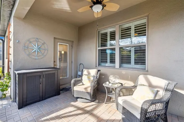 a living room with furniture and window