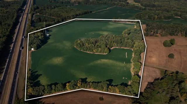 a view of swimming pool from a balcony