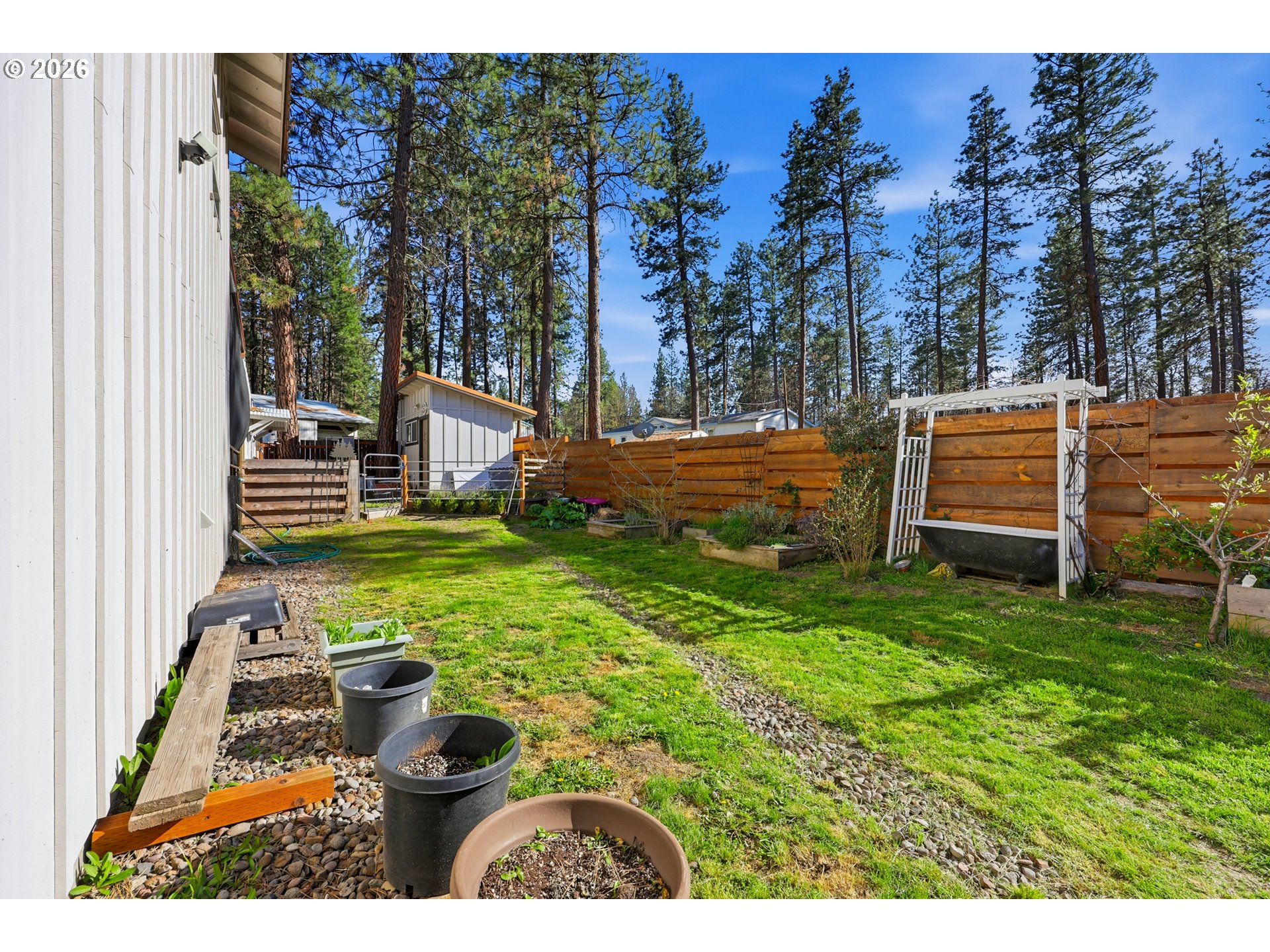 206 South Lakewood Road Tygh Valley, OR 97063 - Photo 45 of 48 a view of a backyard with sitting area