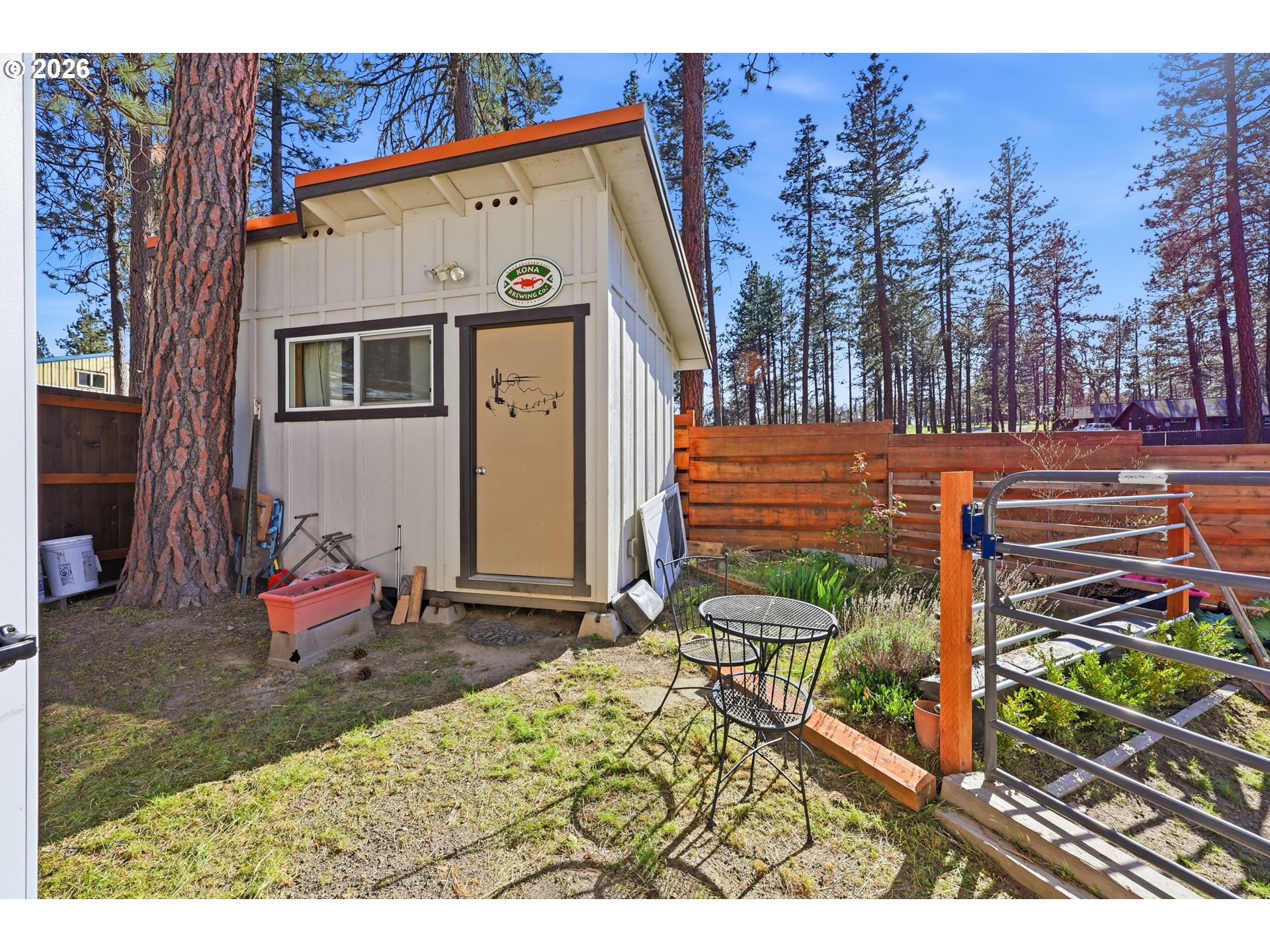 206 South Lakewood Road Tygh Valley, OR 97063 - Photo 46 of 48 a backyard of a house with outdoor seating