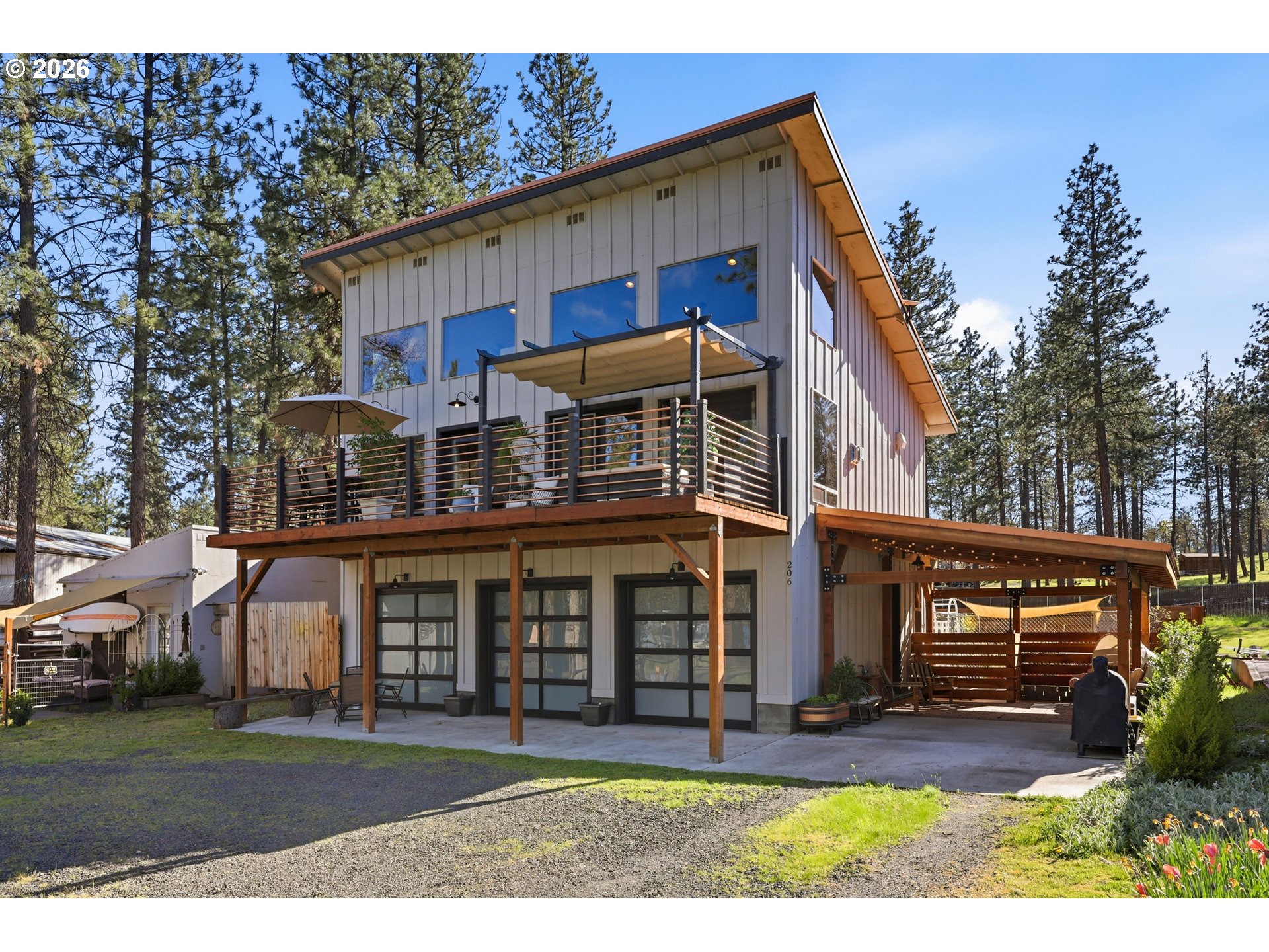 206 South Lakewood Road Tygh Valley, OR 97063 - Photo 7 of 48 a front view of a house with a yard