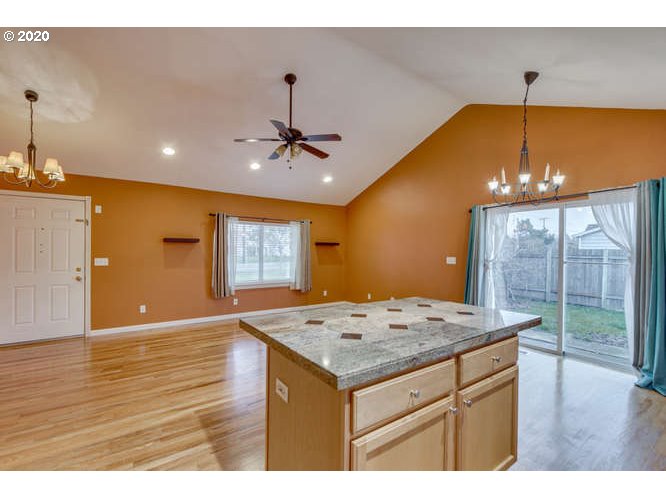 500 Toliver Road Molalla, OR 97038 - Photo 15 of 25 a view of kitchen with a sink chandelier and wooden floor