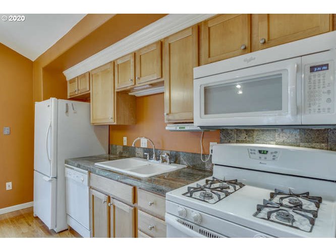 500 Toliver Road Molalla, OR 97038 - Photo 16 of 25 a kitchen with stainless steel appliances granite countertop a sink stove and refrigerator