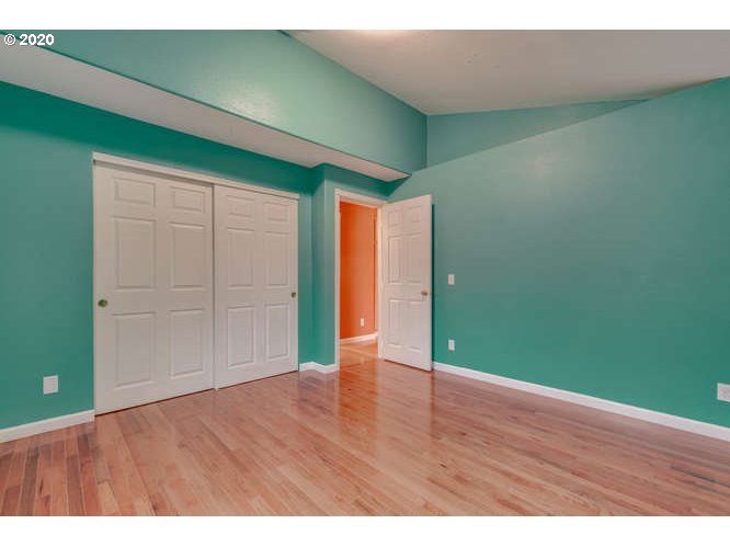 500 Toliver Road Molalla, OR 97038 - Photo 21 of 25 a view of an empty room with closet and wooden floor