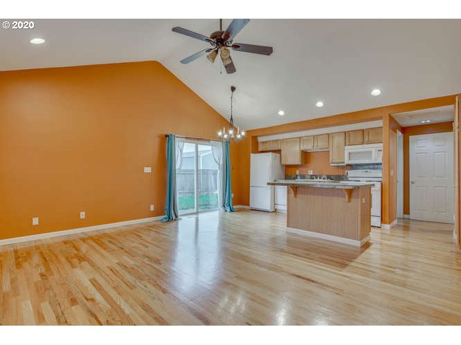 500 Toliver Road Molalla, OR 97038 - Photo 6 of 25 a view of kitchen with stainless steel appliances granite countertop cabinets and wooden floor