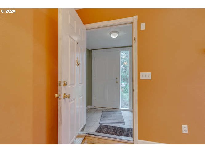 500 Toliver Road Molalla, OR 97038 - Photo 7 of 25 a view of a bathroom with a wooden door