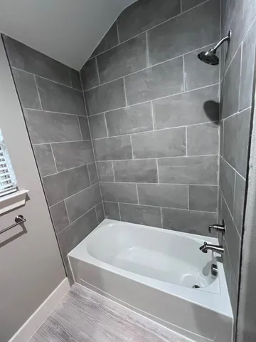 a bathroom with a bathtub