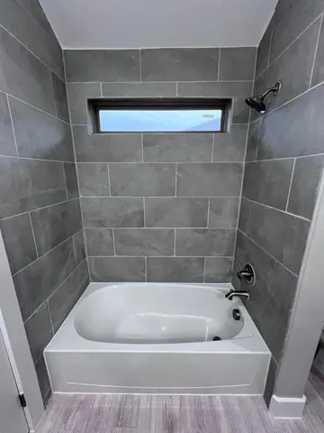 a bathroom with a bathtub
