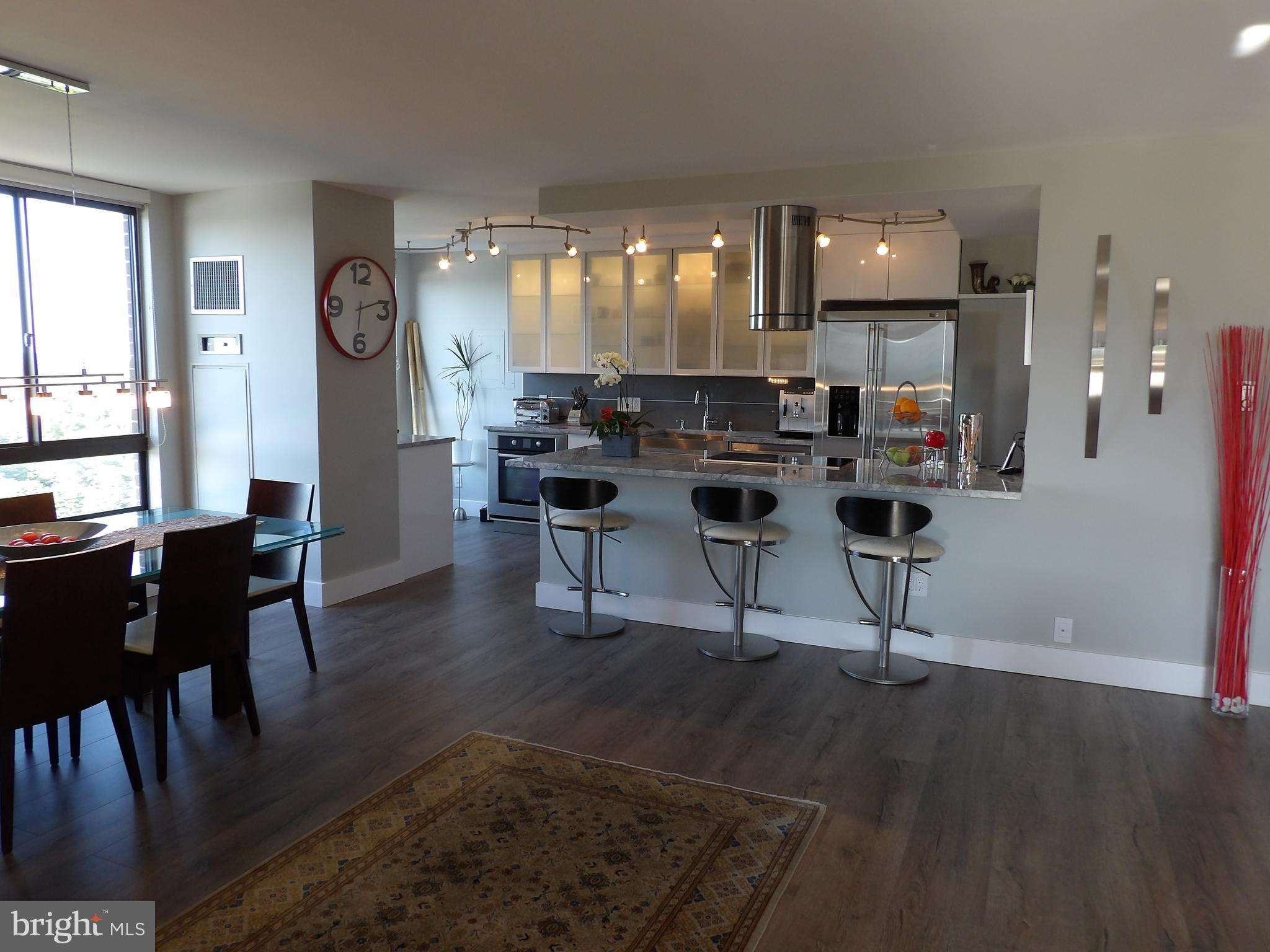 1800 Old Meadow Road, Unit 902 McLean, VA 22102 - Photo 2 of 67 a view of a dining room with furniture and window