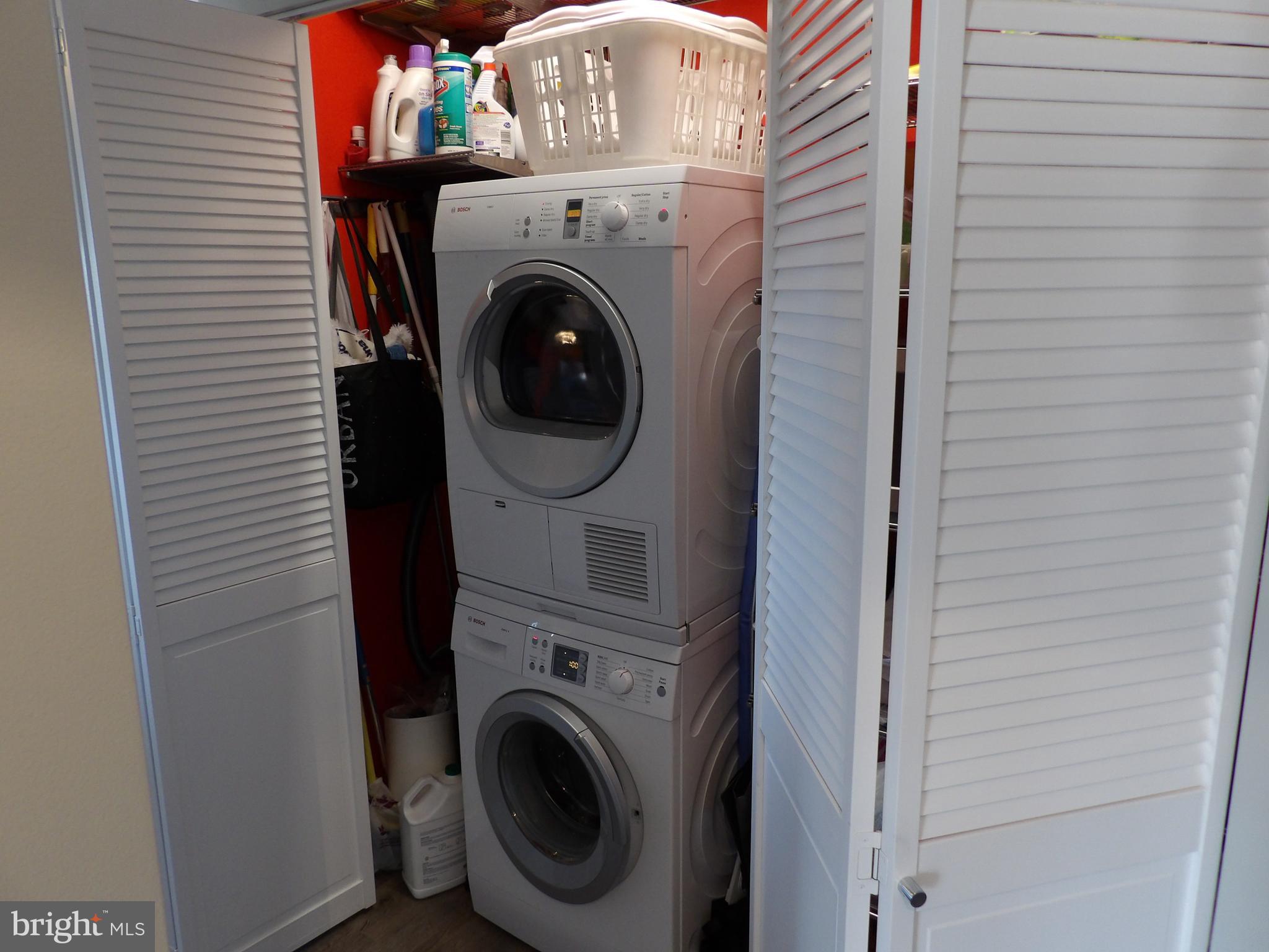 1800 Old Meadow Road, Unit 902 McLean, VA 22102 - Photo 21 of 67 a close up view of a washer and dryer
