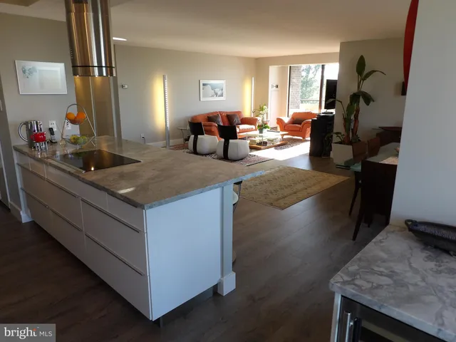 a bathroom with a shower a toilet and a sink