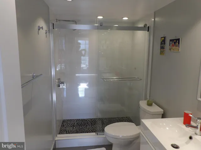 a hallway with wooden floor