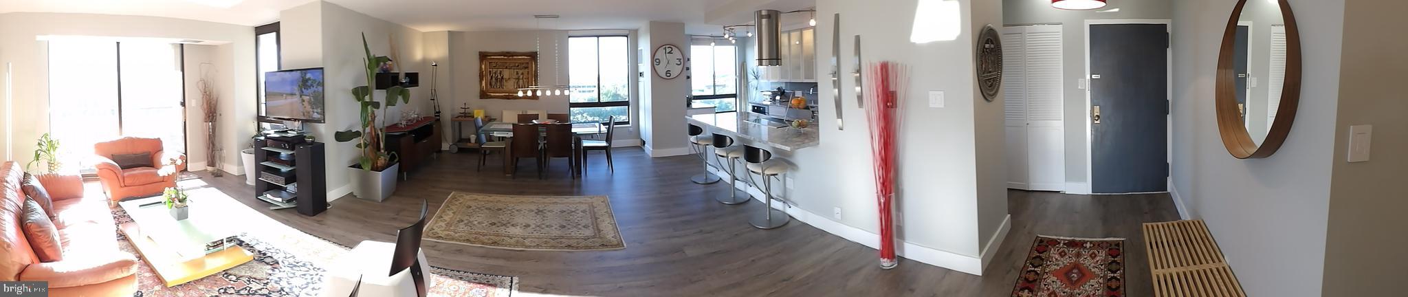 1800 Old Meadow Road, Unit 902 McLean, VA 22102 - Photo 55 of 67 a view of a hallway with wooden floor and stairs