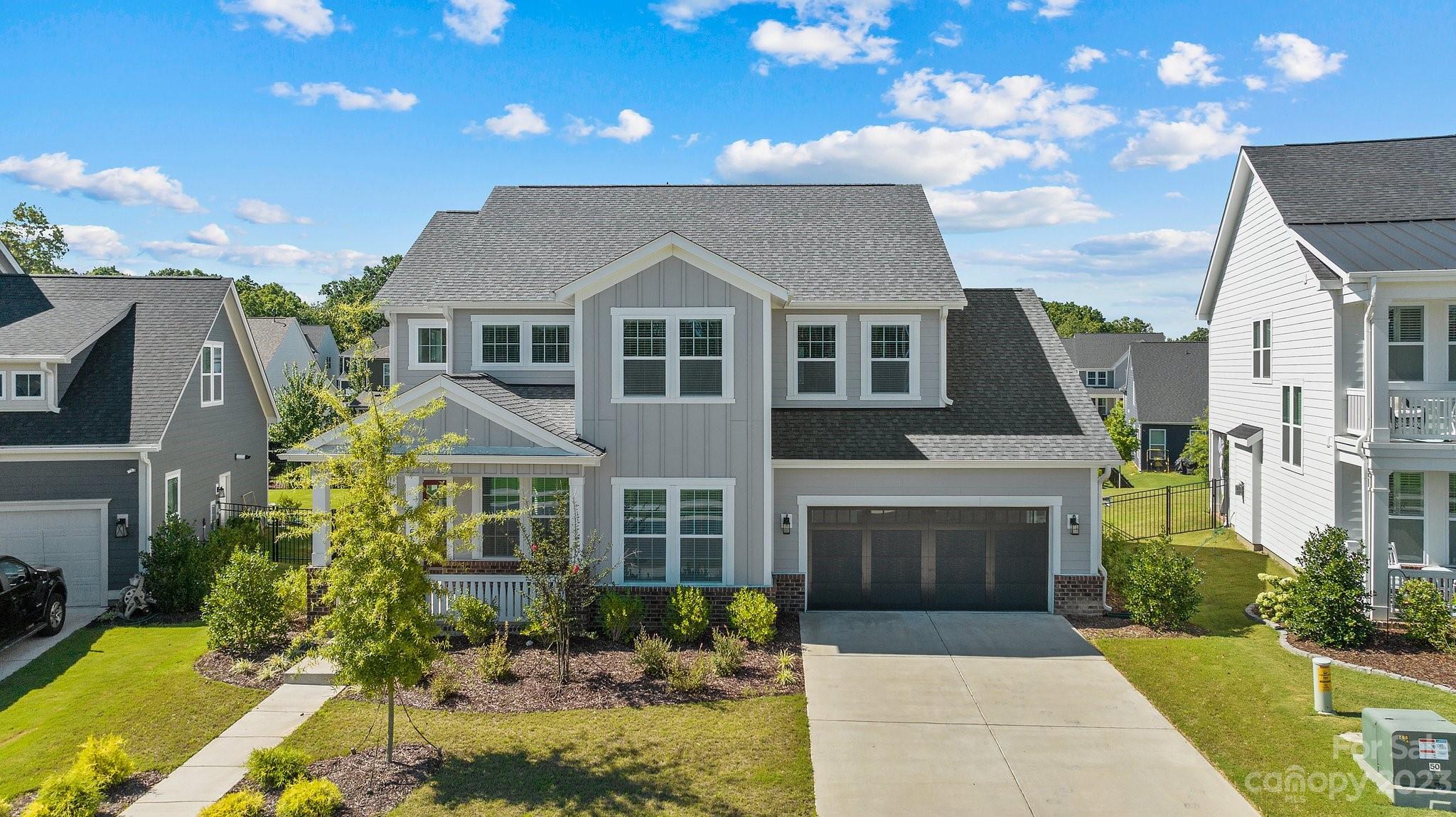 1256 Therns Ferry Drive Fort Mill, SC 29708 - Photo 2 of 47 a front view of a house with a yard