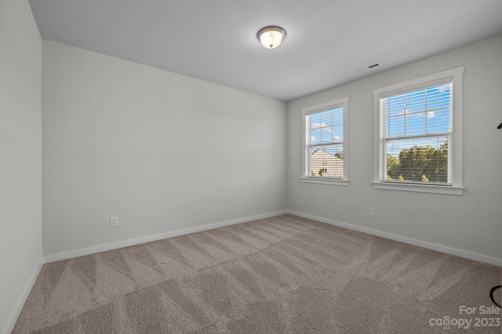 1256 Therns Ferry Drive Fort Mill, SC 29708 - Photo 25 of 47 an empty room with windows