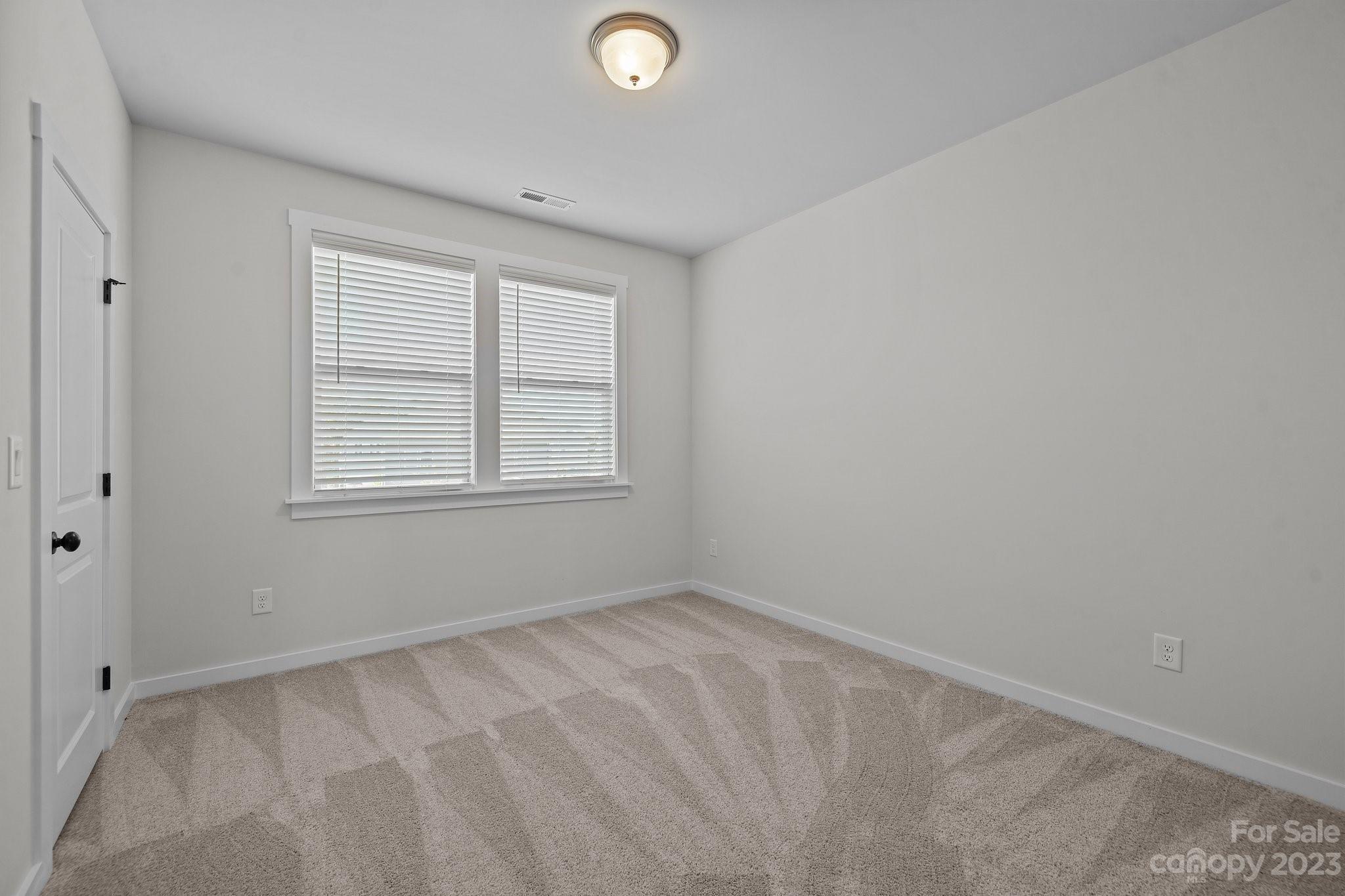1256 Therns Ferry Drive Fort Mill, SC 29708 - Photo 26 of 47 an empty room with windows