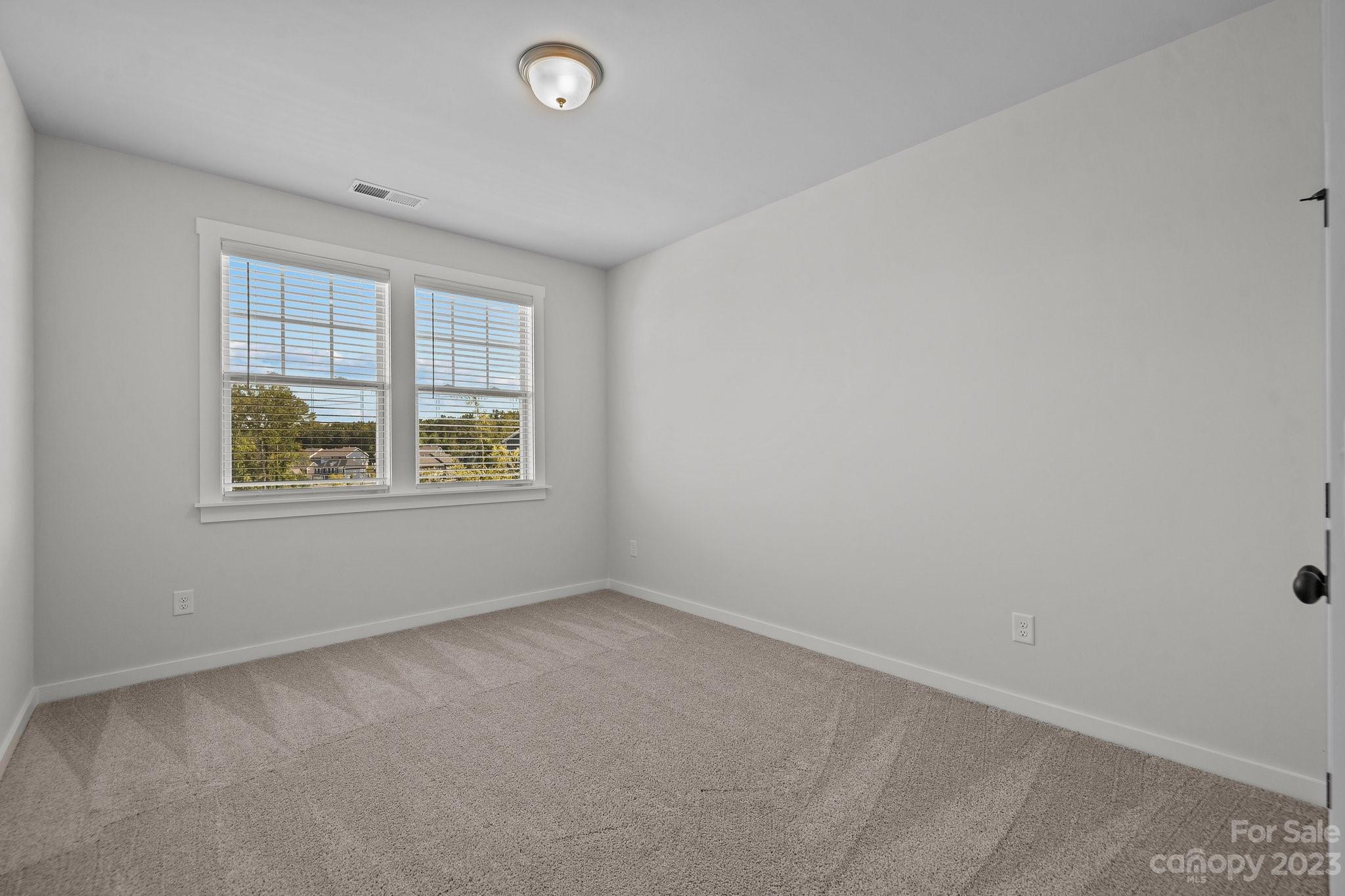 1256 Therns Ferry Drive Fort Mill, SC 29708 - Photo 28 of 47 an empty room with windows