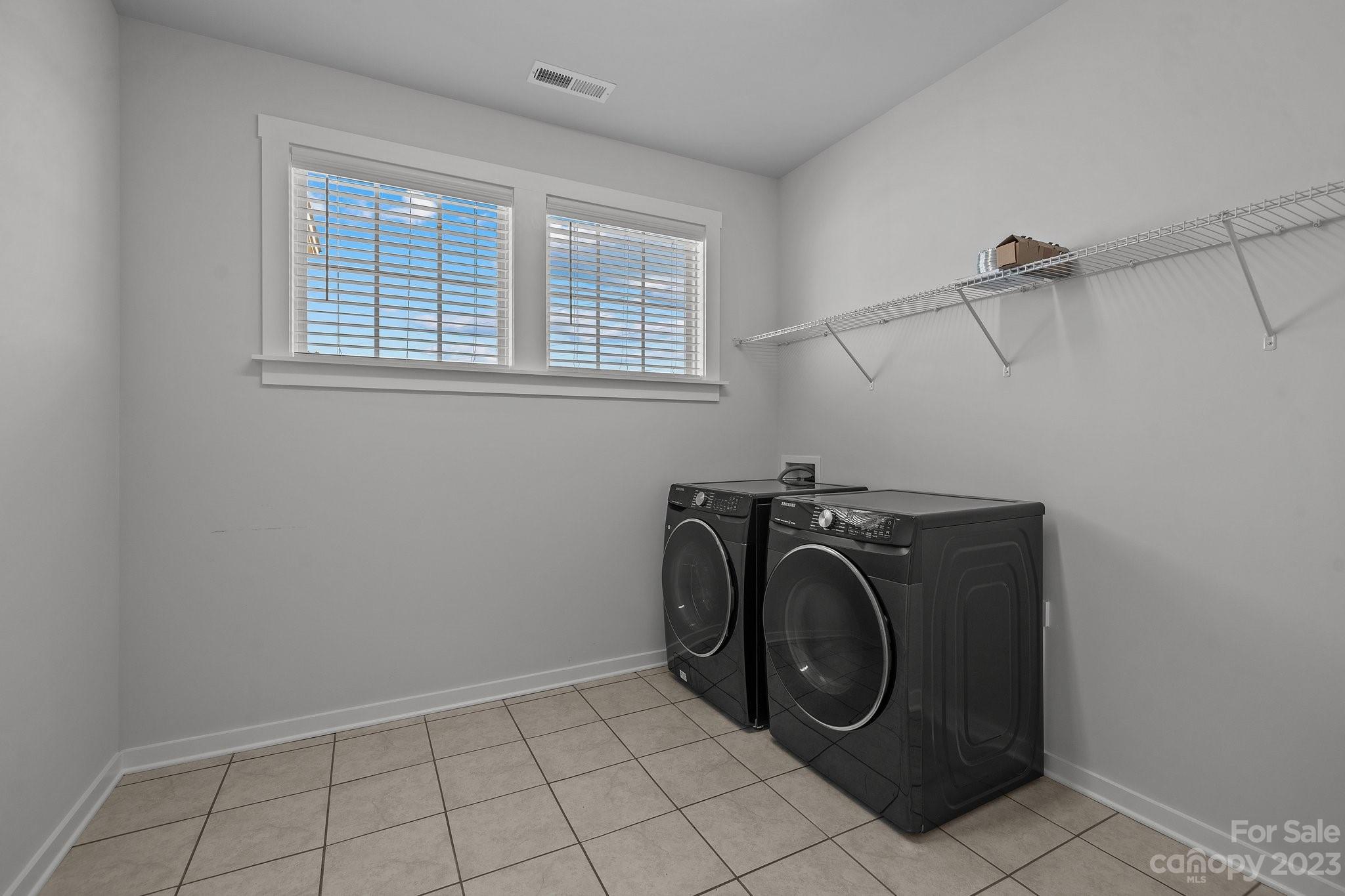 1256 Therns Ferry Drive Fort Mill, SC 29708 - Photo 31 of 47 a utility room with dryer and washer