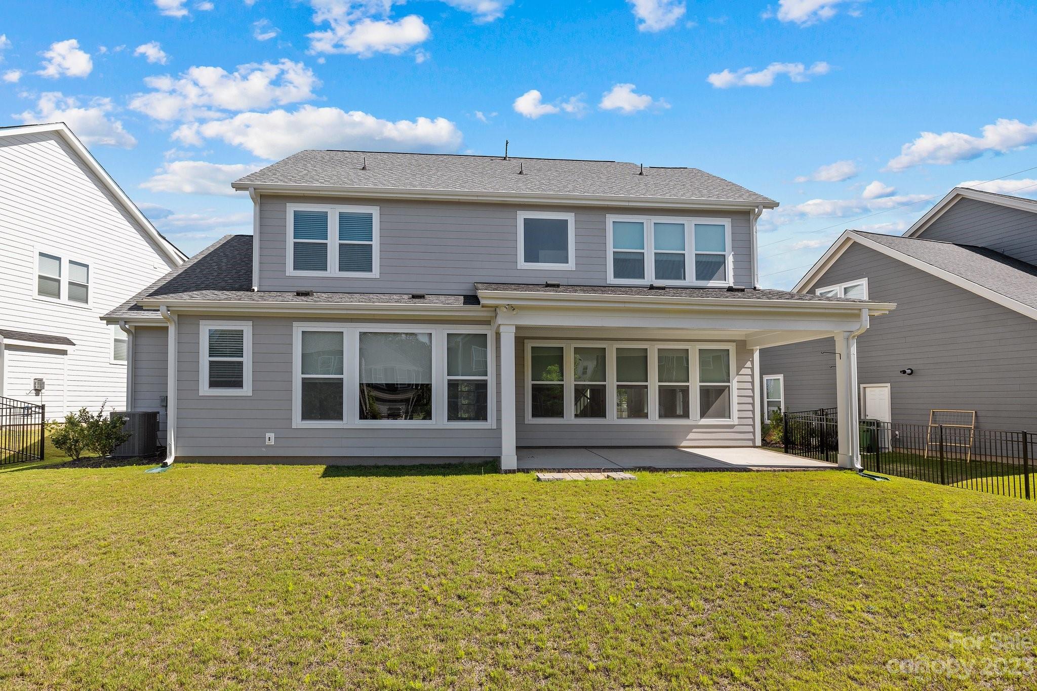 1256 Therns Ferry Drive Fort Mill, SC 29708 - Photo 34 of 47 a front view of a house with a swimming pool