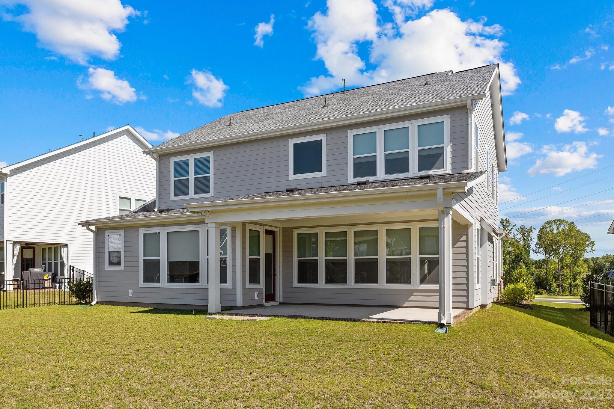 1256 Therns Ferry Drive Fort Mill, SC 29708 - Photo 35 of 47 a view of a house with swimming pool and a yard