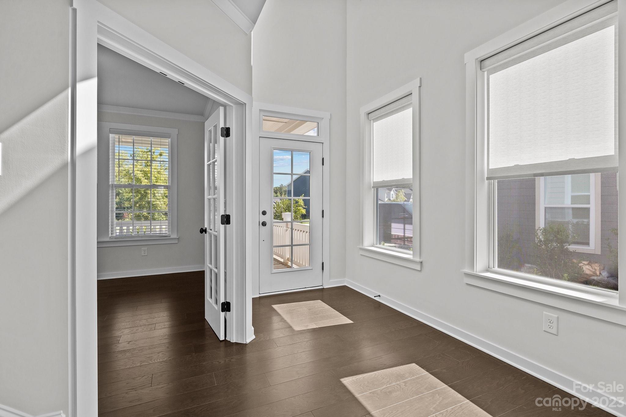 1256 Therns Ferry Drive Fort Mill, SC 29708 - Photo 5 of 47 an empty room with wooden floor and windows