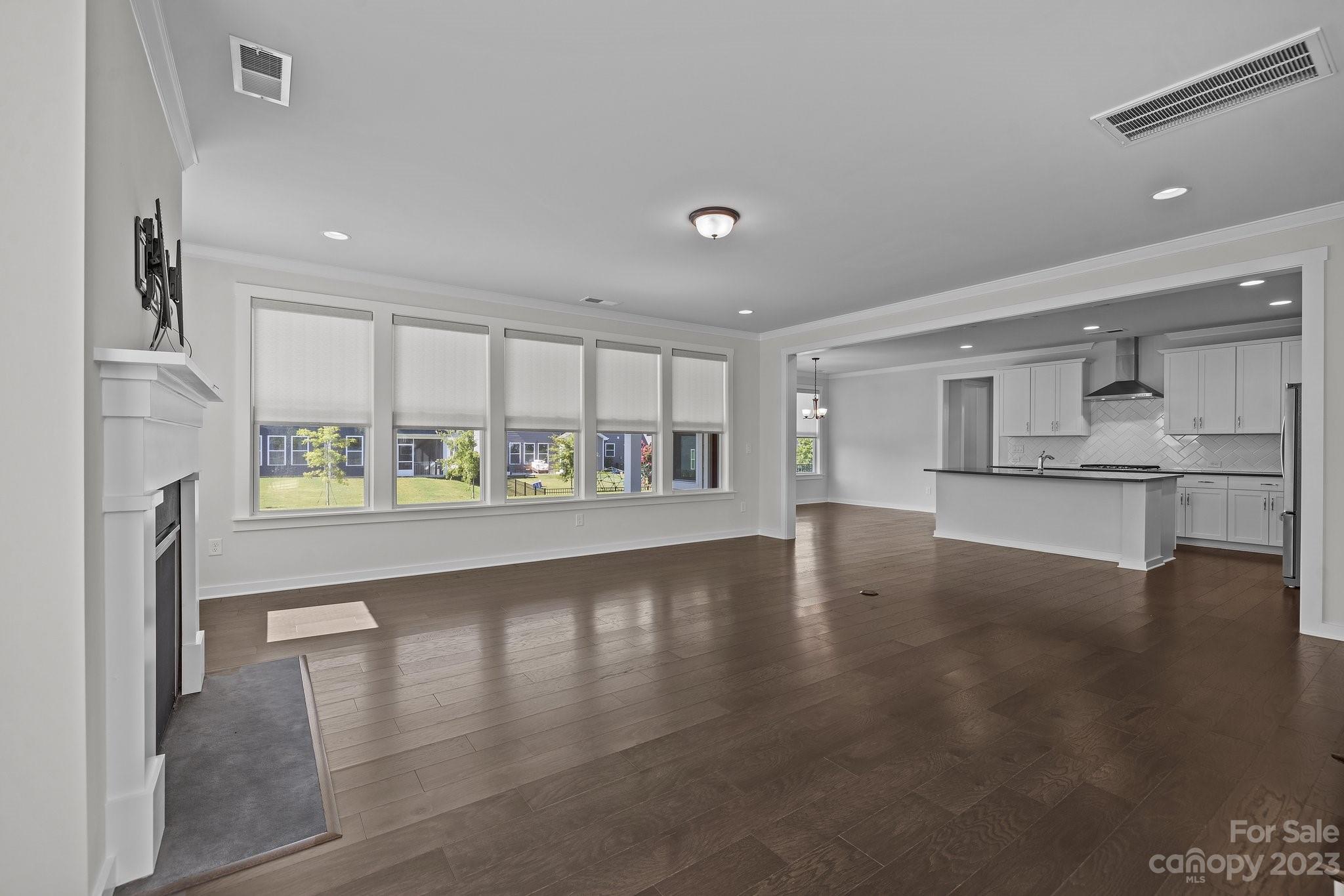 1256 Therns Ferry Drive Fort Mill, SC 29708 - Photo 6 of 47 a view of an empty room with kitchen and a window
