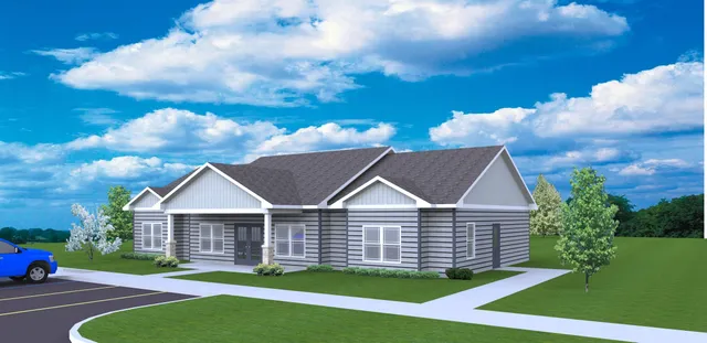 a view of a house with a yard