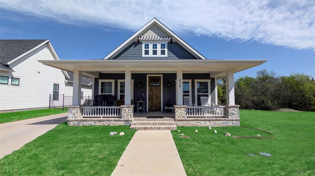 429 Skye Lane Midlothian, TX 76065 - Photo 1 of 29 a front view of a house with garden