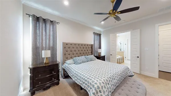 a bedroom with a bed and a walk in closet