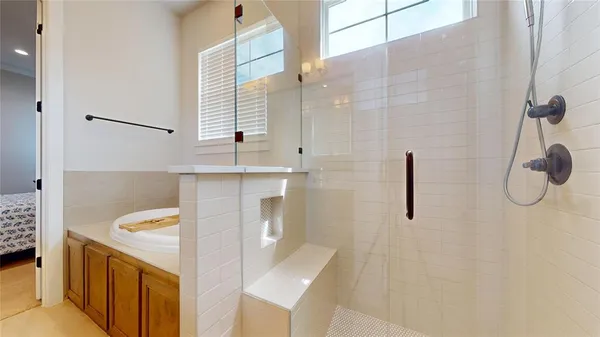 a bathroom with a sink and a shower