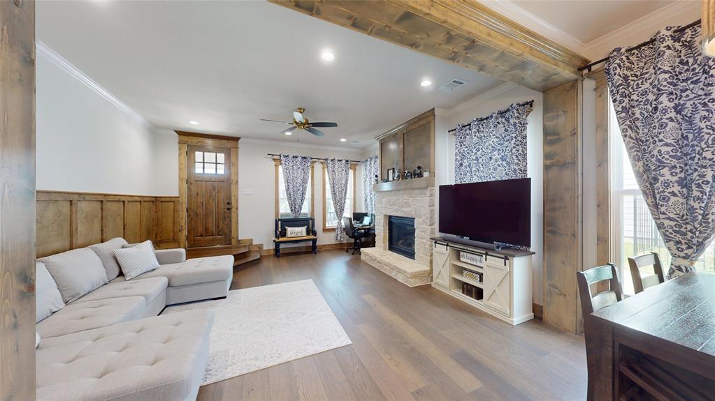 429 Skye Lane Midlothian, TX 76065 - Photo 7 of 29 a living room with furniture and a flat screen tv