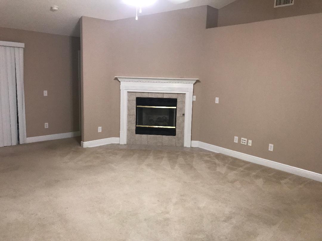 306 Greyfox Circle Crestview, FL 32536 - Photo 3 of 23 a view of an empty room with a fireplace