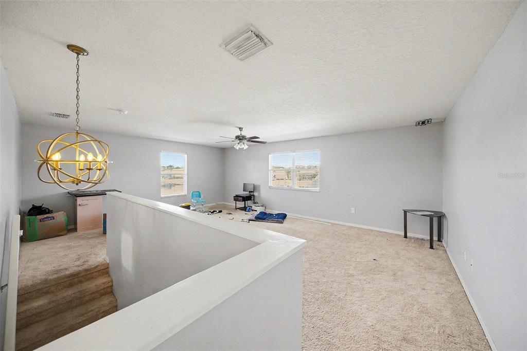 4809 Walnut Ridge Road Land O' Lakes, FL 34638 - Photo 20 of 34 a view of a living room and window
