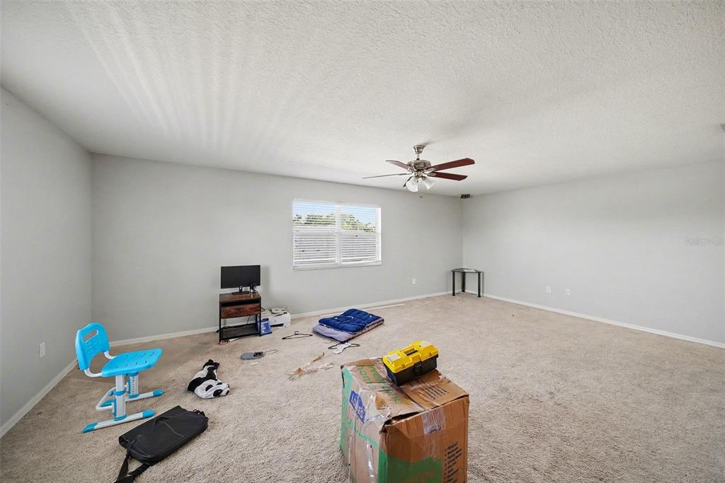 4809 Walnut Ridge Road Land O' Lakes, FL 34638 - Photo 21 of 34 a view of a workspace with furniture