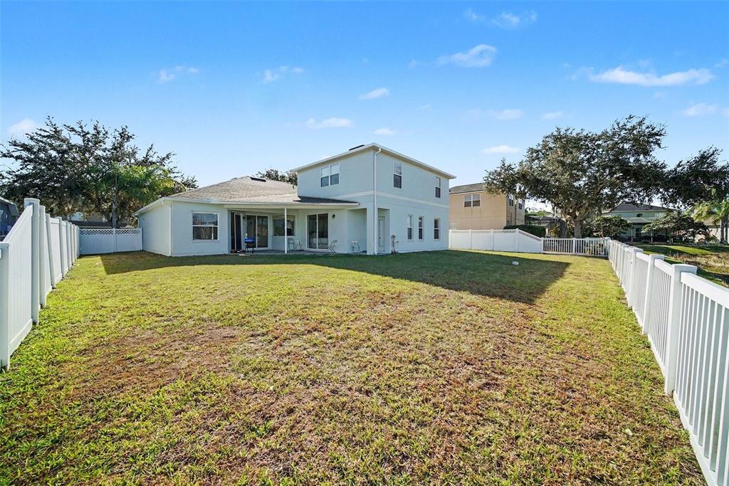 4809 Walnut Ridge Road Land O' Lakes, FL 34638 - Photo 26 of 34 a house with swimming pool in front of it