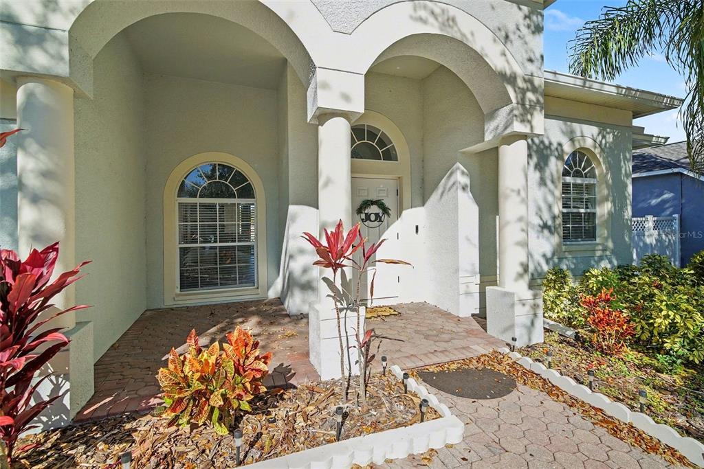 4809 Walnut Ridge Road Land O' Lakes, FL 34638 - Photo 3 of 34 a view of a entryway door of the house